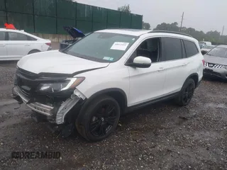 2021 Honda Pilot Special Edition with VIN 5FNYF6H28MB048296, listed as a IAAI auction lot 40012452 with 50,011 mi miles. Bid and sale history available at carsss.com. Image 17.