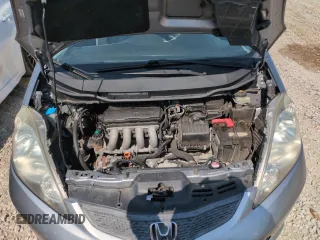 2010 Honda Fit Sport with VIN JHMGE8H41AC002070, listed as a Copart auction lot 62356565 with 148,279 mi miles and Salvage title. Bid and sale history available at DreamBid. Image 11.