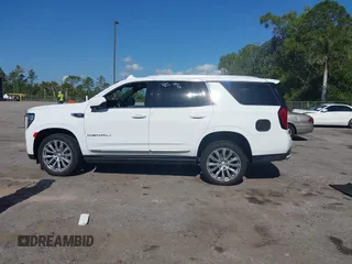 2023 GMC Yukon Denali with VIN 1GKS1DKL2PR303909, listed as a IAAI auction lot 42018679 with 65,532 mi miles. Bid and sale history available at carsss.com. Image 14.