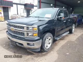 2014 Chevrolet Silverado 1500 LT with VIN 1GCVKREC4EZ110415, listed as a IAAI auction lot 41711383 with 100,344 mi miles and . Bid and sale history available at DreamBid. Image 2.
