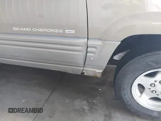 1998 Jeep Grand Cherokee Laredo with VIN 1J4GZ48S4WC262249, listed as a IAAI auction lot 42739473 with 94,094 mi miles and . Bid and sale history available at DreamBid. Image 6.