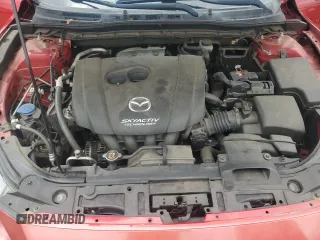 2014 Mazda 3 i Grand Touring z VIN JM1BM1M7XE1101669, wystawiony jako Copart lot #56504335 z przebiegiem 94 832 mil mil oraz Szkoda całkowita • Salvage title. Historia ofert i sprzedaży dostępna na DreamBid. Obrazek 11.