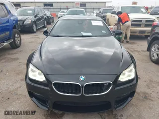 2013 BMW M6 with VIN WBSLX9C50DC968777, listed as a IAAI auction lot 41966918 with 113,458 mi miles. Bid and sale history available at carsss.com. Image 6.