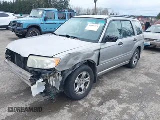 2006 Subaru Forester 2.5 X with VIN JF1SG63676G751013, listed as a IAAI auction lot 41905318 with 214,172 mi miles. Bid and sale history available at carsss.com. Image 2.