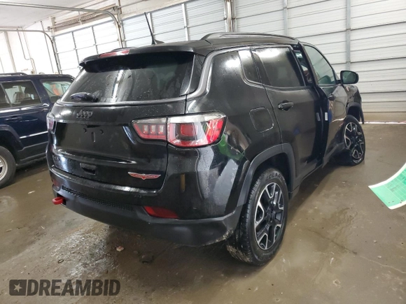 2020 Jeep Compass Trailhawk with VIN 3C4NJDDB0LT159324, listed as a Copart auction lot 50961595 with 86,446 mi miles and Salvage Title. Bid and sale history available at carsss.com. Image 3.