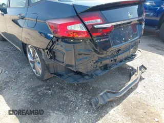 2018 Honda Clarity Touring z VIN JHMZC5F32JC001730, wystawiony jako IAAI lot #41718456 z przebiegiem 64 619 mil mil oraz . Historia ofert i sprzedaży dostępna na DreamBid. Obrazek 21.