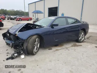 2013 Dodge Charger SXT z VIN 2C3CDXJG6DH567020, wystawiony jako Copart lot #86251014 z przebiegiem 128 719 mil mil oraz Szkody całkowita. Historia ofert i sprzedaży dostępna na DreamBid. Obrazek 1.