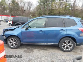 2017 Subaru Forester Touring with VIN JF2SJAWC1HH443799, listed as a IAAI auction lot 41943045 with 122,213 mi miles and . Bid and sale history available at DreamBid. Image 14.