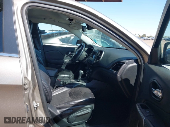 2021 Jeep Cherokee Altitude with VIN 1C4PJLLBXMD155096, listed as a IAAI auction lot 41746319 with 99,423 mi miles and . Bid and sale history available at DreamBid. Image 5.