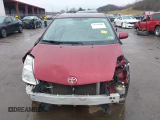 2005 Toyota Prius with VIN JTDKB20UX57037797, listed as a IAAI auction lot 41792880 with 259,123 mi miles. Bid and sale history available at carsss.com. Image 13.