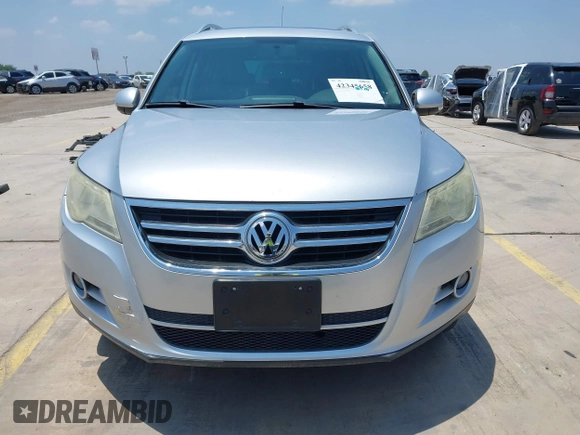 2010 Volkswagen Tiguan S with VIN WVGAV7AX6AW510843, listed as a IAAI auction lot 42345658 with 126,313 mi miles and . Bid and sale history available at DreamBid. Image 13.