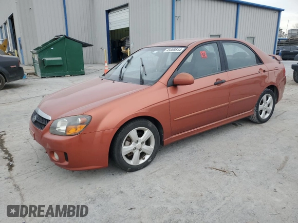 2009 Kia Spectra SX with VIN KNAFE221095026589, listed as a Copart auction lot 45005514 with 203,779 mi miles and Salvage Title. Bid and sale history available at carsss.com. Image 1.