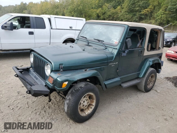 2000 Jeep Wrangler Sahara with VIN 1J4FA59S1YP747919, listed as a Copart auction lot 72278044 with 157,360 mi miles and Salvage Title. Bid and sale history available at carsss.com. Image 1.