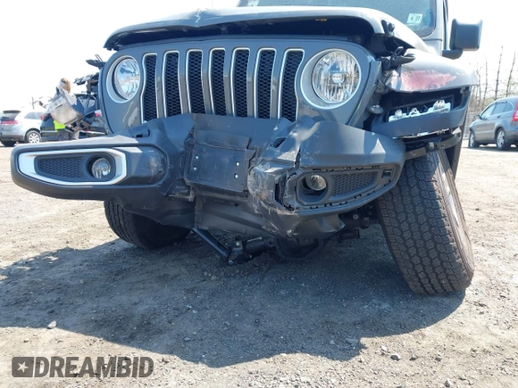2022 Jeep Wrangler Unlimited Sahara with VIN 1C4HJXEM7NW206585, listed as a IAAI auction lot 42102516 with 10,769 mi miles and . Bid and sale history available at DreamBid. Image 18.