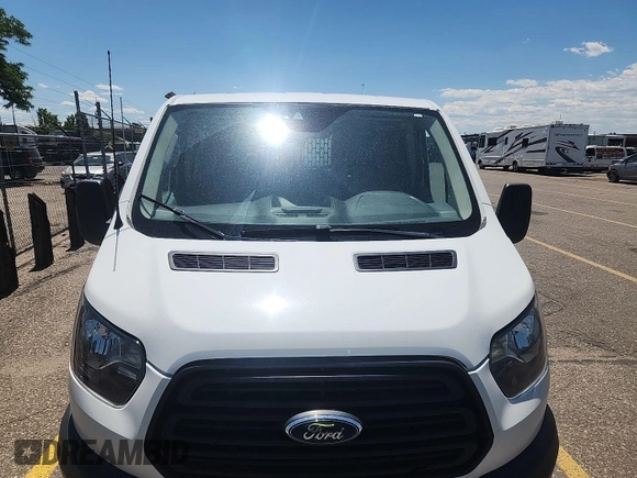 2018 Ford Transit with VIN 1FTYE1YM6JKB52209, listed as a IAAI auction lot 42801071 with 159,984 mi miles and . Bid and sale history available at DreamBid. Image 5.