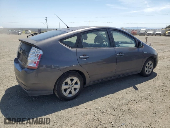 2007 Toyota Prius z VIN JTDKB20U473211597, wystawiony jako Copart lot #58437915 z przebiegiem 252 737 mil mil oraz Szkoda całkowita • Salvage title. Historia ofert i sprzedaży dostępna na DreamBid. Obrazek 3.