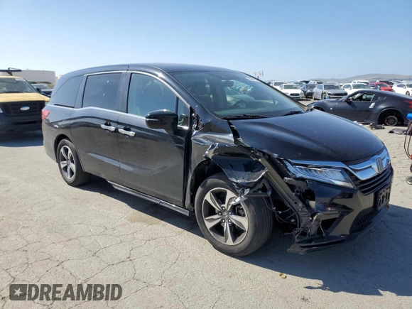 2018 Honda Odyssey Touring with VIN 5FNRL6H80JB065039, listed as a Copart auction lot 54944595 with 81,987 mi miles and Salvage Title. Bid and sale history available at carsss.com. Image 4.