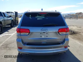 2020 Jeep Grand Cherokee Summit z VIN 1C4RJFJG2LC173184, wystawiony jako IAAI lot #41343182 z przebiegiem 70 192 mil mil oraz . Historia ofert i sprzedaży dostępna na DreamBid. Obrazek 16.