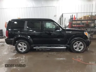 2007 Dodge Nitro SLT with VIN 1D8GT58K77W724530, listed as a IAAI auction lot 41499022 with 214,183 mi miles. Bid and sale history available at carsss.com. Image 13.