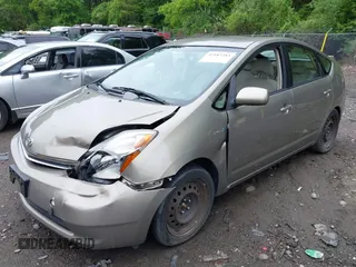 2007 Toyota Prius z VIN JTDKB20U377590729, wystawiony jako IAAI lot #42187283 z przebiegiem 156 047 mil mil oraz . Historia ofert i sprzedaży dostępna na DreamBid. Obrazek 2.