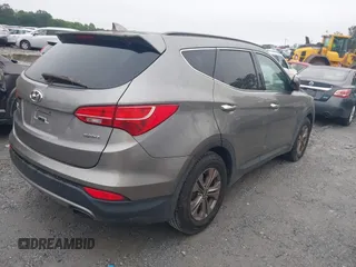 2015 Hyundai Santa Fe z VIN 5XYZU3LB4FG264397, wystawiony jako IAAI lot #42362877 z przebiegiem 177 252 mil mil oraz . Historia ofert i sprzedaży dostępna na DreamBid. Obrazek 4.