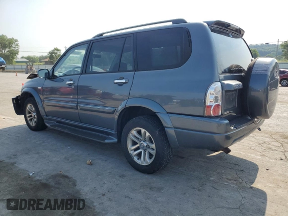 2004 Suzuki XL7 LX with VIN JS3TX92V844109991, listed as a Copart auction lot 58934415 with 205,951 mi miles and Salvage title. Bid and sale history available at DreamBid. Image 2.