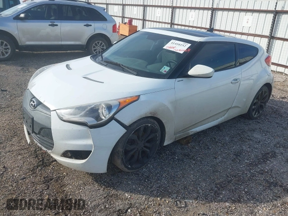 2013 Hyundai Veloster w/Gray Int with VIN KMHTC6AD4DU140121, listed as a IAAI auction lot 41410252 with 202,596 mi miles and . Bid and sale history available at DreamBid. Image 2.