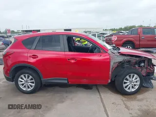 2015 Mazda CX-5 Touring with VIN JM3KE2CY3F0459076, listed as a IAAI auction lot 41913044 with 83,960 mi miles. Bid and sale history available at carsss.com. Image 14.