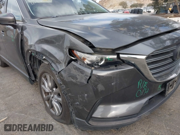 2018 Mazda CX-9 Sport with VIN JM3TCABY1J0224741, listed as a IAAI auction lot 41265876 with 126,686 mi miles and . Bid and sale history available at DreamBid. Image 6.