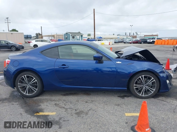 2015 Scion FR-S z VIN JF1ZNAA11F8709669, wystawiony jako IAAI lot #41794094 z przebiegiem 109 940 mil mil oraz . Historia ofert i sprzedaży dostępna na DreamBid. Obrazek 13.