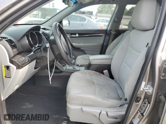 2013 Kia Sorento LX with VIN 5XYKT3A14DG386074, listed as a Copart auction lot 59879935 with 163,427 mi miles and Salvage title. Bid and sale history available at DreamBid. Image 7.