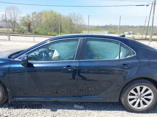 2019 Toyota Camry LE z VIN 4T1B11HK7KU269928, wystawiony jako IAAI lot #42048750 z przebiegiem 102 585 mil mil oraz . Historia ofert i sprzedaży dostępna na DreamBid. Obrazek 14.