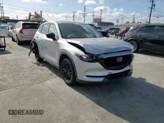 2019 Mazda CX-5 Touring with VIN JM3KFACMXK1556090, listed as a Copart auction lot 47541005 with 82,030 mi miles and Salvage Title. Bid and sale history available at carsss.com. Image 11.
