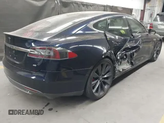 2014 Tesla Model S 60 with VIN 5YJSA1H11EFP56406, listed as a IAAI auction lot 42065157 with Not Provided miles and . Bid and sale history available at DreamBid. Image 4.