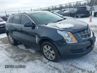 2010 Cadillac SRX Luxury Collection z VIN 3GYFNAEY3AS637162, wystawiony jako IAAI lot #41382442 z przebiegiem 169 558 mil mil oraz . Historia ofert i sprzedaży dostępna na DreamBid. Obrazek 1.
