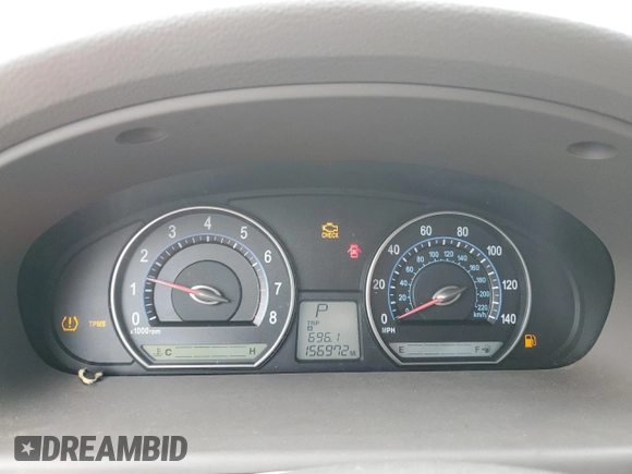 2008 Kia Optima LX z VIN KNAGE124385198719, wystawiony jako Copart lot #55449255 z przebiegiem 156 972 mil mil oraz Szkoda całkowita • Salvage title. Historia ofert i sprzedaży dostępna na DreamBid. Obrazek 9.
