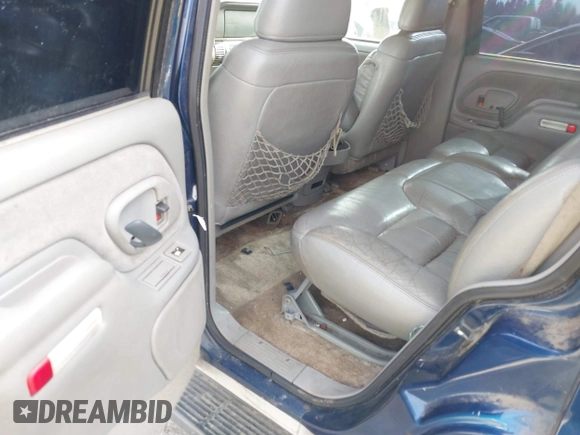 1997 GMC Yukon with VIN 1GKEK13R8VJ737324, listed as a IAAI auction lot 41675479 with 237,223 mi miles. Bid and sale history available at carsss.com. Image 8.