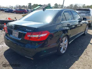 2012 Mercedes-Benz E-Class E 350 Luxury with VIN WDDHF8JB0CA614034, listed as a IAAI auction lot 42036672 with 65,049 mi miles. Bid and sale history available at carsss.com. Image 4.