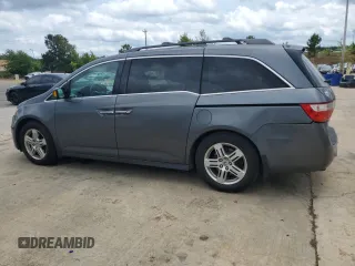 2012 Honda Odyssey Touring with VIN 5FNRL5H90CB050580, listed as a Copart auction lot 58502925 with 226,929 mi miles and Salvage title. Bid and sale history available at DreamBid. Image 2.