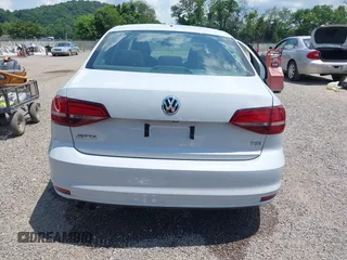 2017 Volkswagen Jetta S z VIN 3VW2B7AJ8HM242804, wystawiony jako IAAI lot #42595566 z przebiegiem 96 551 mil mil oraz . Historia ofert i sprzedaży dostępna na DreamBid. Obrazek 17.