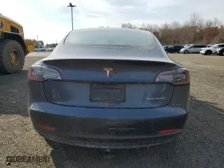 2022 Tesla Model 3 Long Range with VIN 5YJ3E1EB3NF275515, listed as a Copart auction lot 52566515 with 55,980 mi miles and Salvage Title. Bid and sale history available at carsss.com. Image 6.