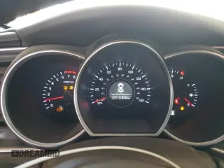 2014 Kia Optima EX z VIN 5XXGN4A71EG275210, wystawiony jako Copart lot #58095515 z przebiegiem 113 030 mil mil oraz Szkoda całkowita • Salvage title. Historia ofert i sprzedaży dostępna na DreamBid. Obrazek 9.