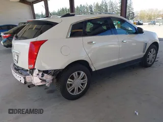 2015 Cadillac SRX Luxury Collection with VIN 3GYFNEE35FS573256, listed as a IAAI auction lot 41965935 with 79,207 mi miles. Bid and sale history available at carsss.com. Image 4.