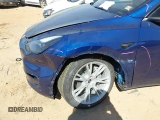 2023 Tesla Model Y Long Range with VIN 7SAYGDEE6PF847890, listed as a IAAI auction lot 41635687 with 32,846 mi miles and . Bid and sale history available at DreamBid. Image 6.