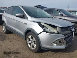 2013 Ford Escape SE z VIN 1FMCU9GX3DUD89025, wystawiony jako IAAI lot #40969661 z przebiegiem 182 043 mil mil oraz . Historia ofert i sprzedaży dostępna na DreamBid. Obrazek 1.