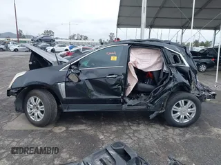 2015 Cadillac SRX with VIN 3GYFNAE36FS573940, listed as a IAAI auction lot 41808779 with Not Provided miles and . Bid and sale history available at DreamBid. Image 13.
