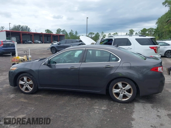 2009 Acura TSX with VIN JH4CU26609C021322, listed as a IAAI auction lot 42241694 with Not provided miles and . Bid and sale history available at DreamBid. Image 14.