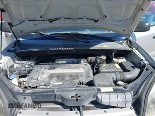 2006 Hyundai Tucson GL with VIN KM8JM12BX6U249982, listed as a IAAI auction lot 41976033 with 107,153 mi miles. Bid and sale history available at carsss.com. Image 10.