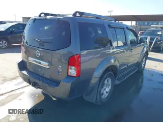 2005 Nissan Pathfinder SE with VIN 5N1AR18U45C751529, listed as a IAAI auction lot 41009894 with 167,023 mi miles. Bid and sale history available at carsss.com. Image 4.