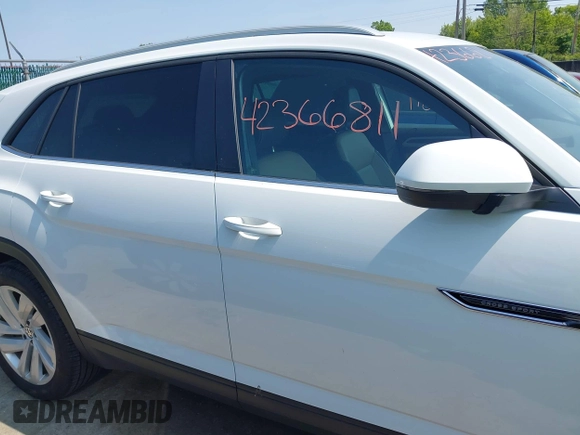 2022 Volkswagen Atlas SE z VIN 1V2HE2CA5NC225233, wystawiony jako IAAI lot #42366811 z przebiegiem 27 986 mil mil oraz . Historia ofert i sprzedaży dostępna na DreamBid. Obrazek 14.